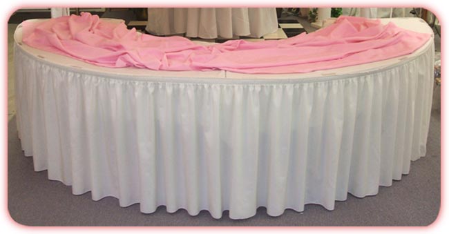 Curved tables with skirting